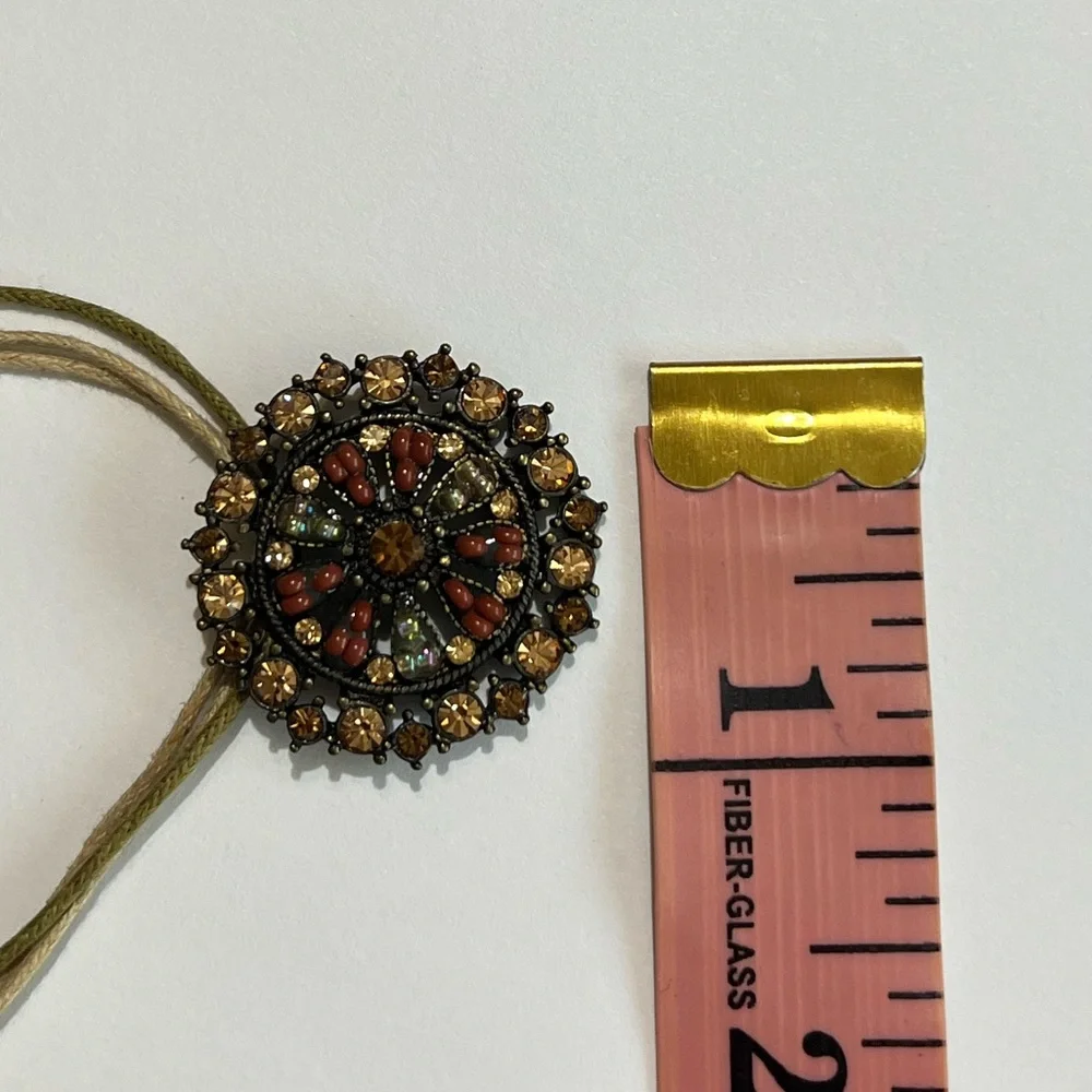 Round Pendant Multi-Color Brilliant Stones Gold Cord Strand